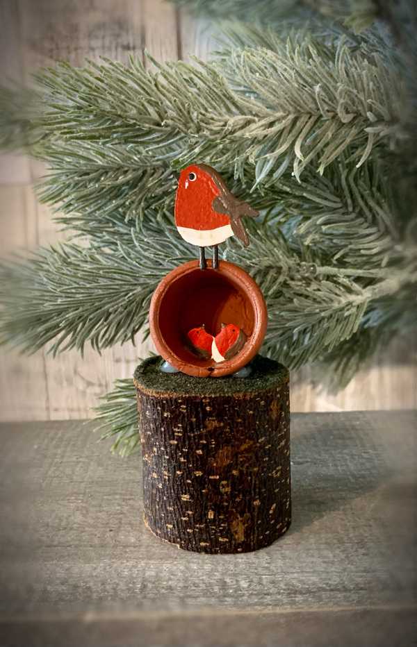 Robin Nesting In A Plant Pot Decoration